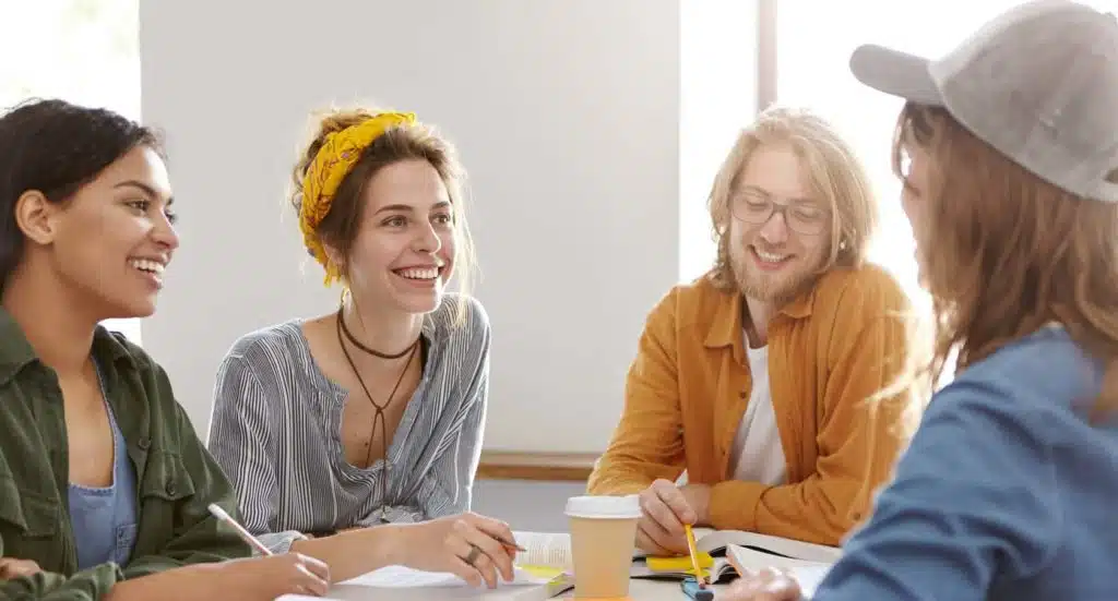 Adult students engaging in a conversation class