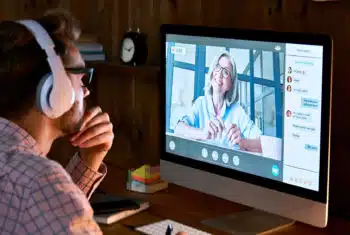 TEFL student completing accredited online TEFL course on laptop