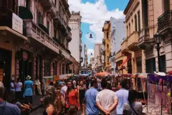 A solo traveller walking through European town