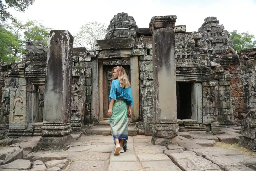 A solo traveller exploring Angkor Wat in Cambodia