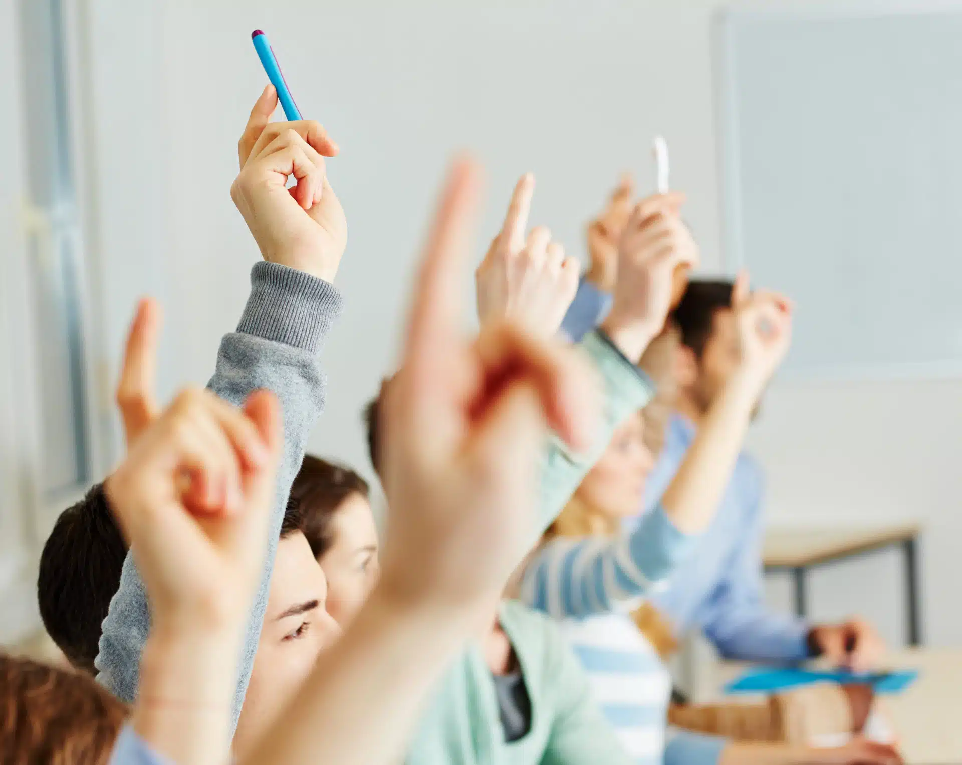 students asking questions in the EFL classroom