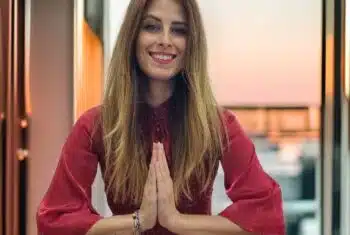 Teacher Timea showing a traditional Vietnamese greeting