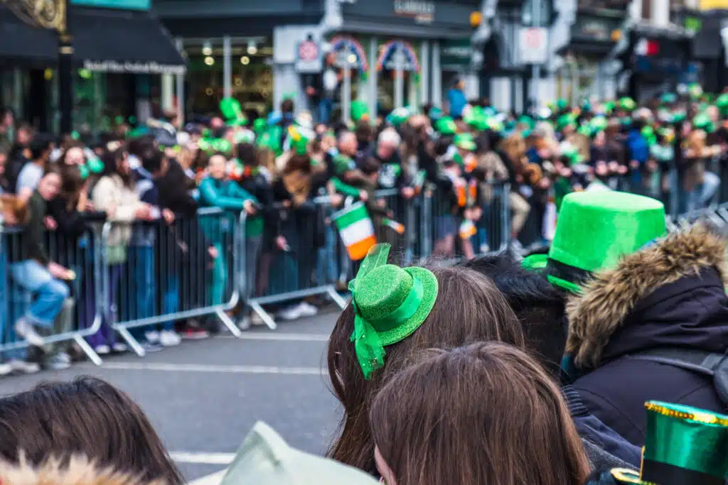 Green hats in a crowd in the Saint Patrick's day parade in Dublin