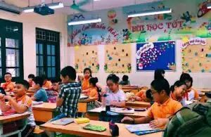 TTA alumna Taylor on a scooter in Hanoi