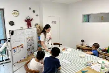 Teacher Chloe and her students during a lesson