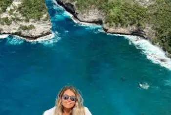 Taylor posing with a view of Bali behind her