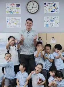 Vietnamese students learning English at modern private school in Hanoi